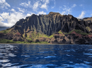 The majestic Napali Coast in Kauai, as seen from the ocean, reveals a breathtaking mountain range